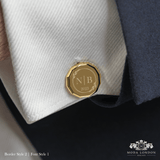 Exclusive design gold cufflinks for sophisticated wedding attire.